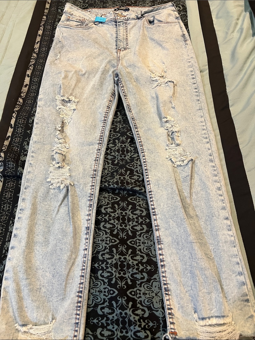 Cuidado con el Perro  Ripped Light Blue Jeans for Women - Casual Distressed